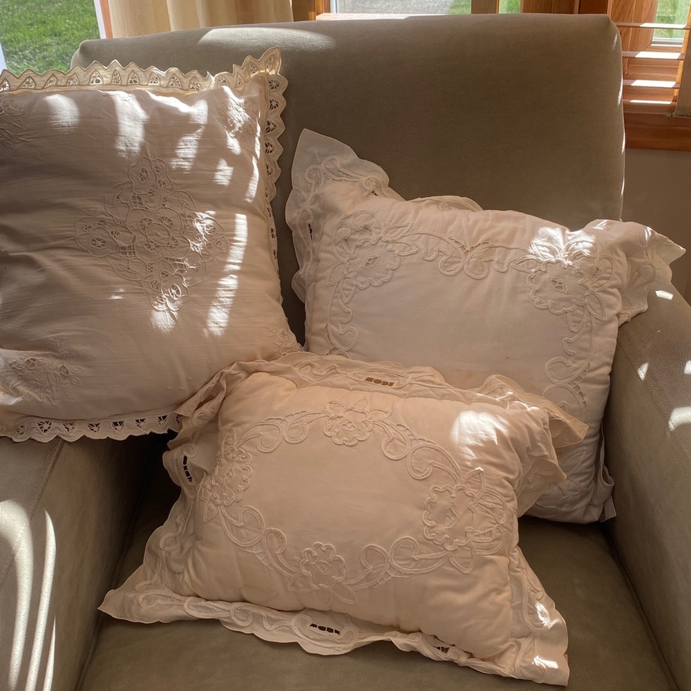 3 Vintage pillows, . 2 square snd 1 rectangular. Not hand made .